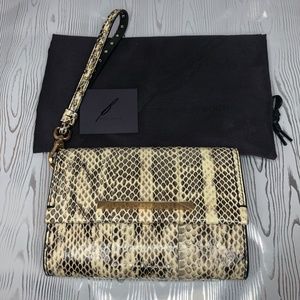 Brian Atwood Pure leather snake print clutch